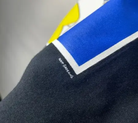 close up of a licensed fashion silk screen print with detailed text that reads "matt groening" of the simpsons.