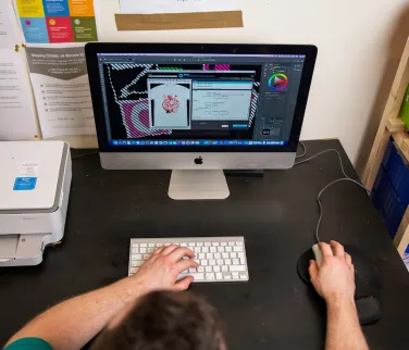 artwork being prepared for a digital print on a white t shirt.