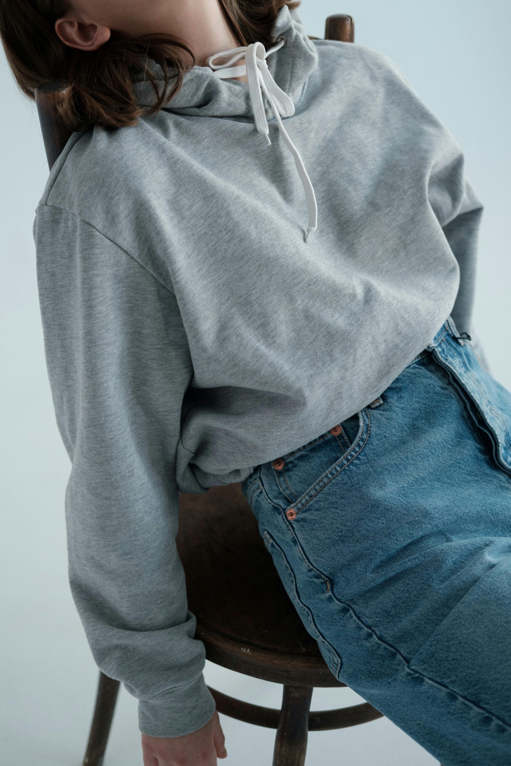 layers of hoodies with text that reads ascolour overlaying the image