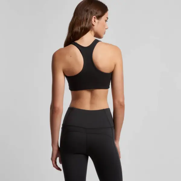 Black racerback sports bra shown from back view with matching high-waisted leggings.