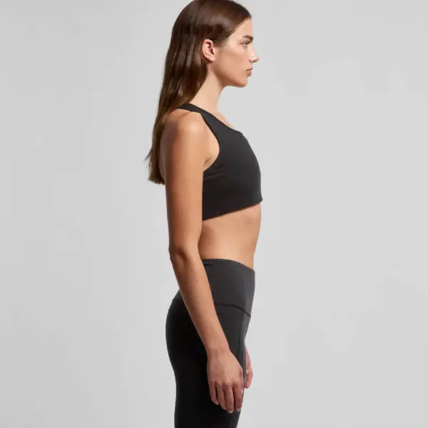 Side view of black sports bra showing sleek silhouette and minimal seam design